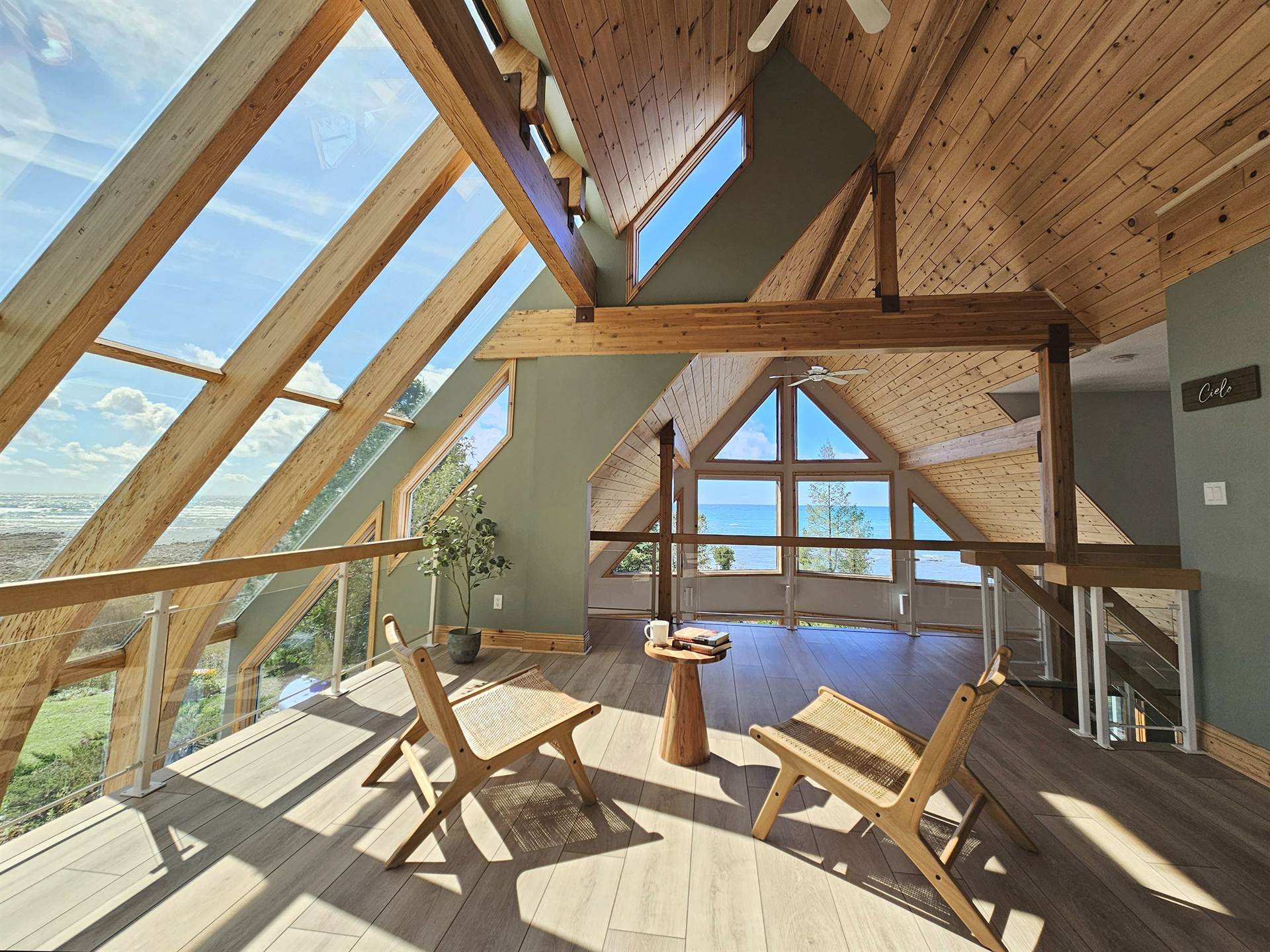 Casolena's signature glass, the lake and sky windows